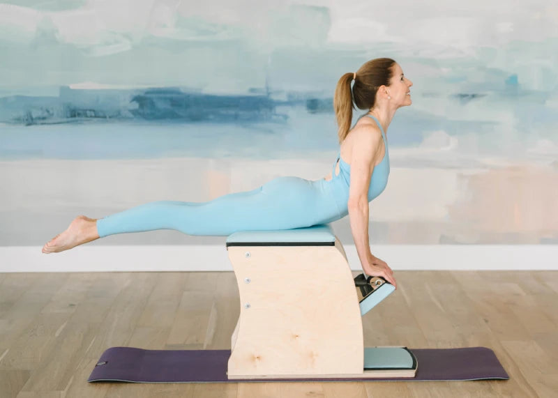 Woman doing exercise on Pilates Wunda Chair